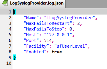 The LogSyslogProvider.log.json configuration file showing the default settings, including host 127.0.0.1 and port 514